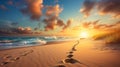 Picturesque sunset beach with waves, footprints, and golden sands creating a serene scene Royalty Free Stock Photo