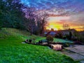 Picturesque sunset over the backyard of a charming residential home. Royalty Free Stock Photo
