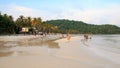 Trees, palms and people on Sao beach, Phu Quoc, Vietnam - December 2018. Royalty Free Stock Photo