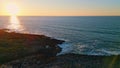 Picturesque sunset summer ocean. Aerial view sun rays reflecting in sea surface. Royalty Free Stock Photo