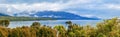 Picturesque Te Anau lake and blue mountains panorama, New Zealand Royalty Free Stock Photo