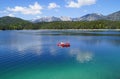 scenic turquoise lake Eibsee by the foot of mountain Zugspitze in Bavaria (the Alps in Germany)