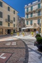 Picturesque urban square in Noli, Italy