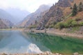 Picturesque Urungach lake in mountains on early autumn in Uzbekistan Royalty Free Stock Photo