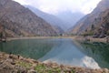 Picturesque Urungach lake in mountains on early autumn in Uzbekistan Royalty Free Stock Photo