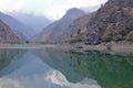 Picturesque Urungach lake in mountains on early autumn in Uzbekistan Royalty Free Stock Photo