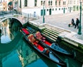 Picturesque view of ancient buildings, bridge and channel with gondolas in Venice, Italy. Beautiful romantic italian city.