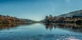 A picturesque view from the bank of the Sylva River on a bright autumn day.