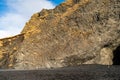 basalt formation cave at the black sand beach in iceland next to the sea Royalty Free Stock Photo