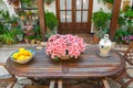 Picturesque view of center table of traditional Spanish festival with Open Patios in Cordoba. Andalusia. Spain