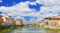 Picturesque view on colorful Ponte Vecchio over Arno River in Florence, Italy Royalty Free Stock Photo