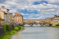 Picturesque view on colorful Ponte Vecchio over Arno River in Florence, Italy Royalty Free Stock Photo