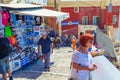Traditional commercial street tourist attraction in Fira Santorini Greece