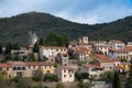 Picturesque view of Cucugnan commune with main landmark 17th-century windmill, Aude department, southern France Royalty Free Stock Photo