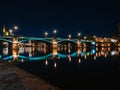 Picturesque view of the Frankfurt skyline illuminated by the lights of the shoreline at night Royalty Free Stock Photo