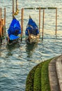 Picturesque view of Gondolas on lateral narrow Canal, Venice, Italy. Royalty Free Stock Photo