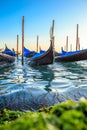 Picturesque view of Gondolas on lateral narrow Canal, Venice, Italy. Royalty Free Stock Photo