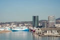 Picturesque view of a harbor with a collection of sailboats docked near the shoreline, in Marseille