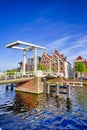 Picturesque View of Harlem Sight With Gravestenenbrug Bridge on Spaarne River On The Background At Noon