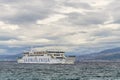 Picturesque view of Jadrolinija ferry on the way to Supetar. Jadrolinija is Croatian shipping company founded in 1947 in Rijeka.