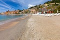 Menton. Antique multi-colored facades of medieval houses on the shore of the bay.