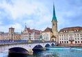 Munsterbrucke bridge that spans the Limmat River and stunning Fraumunster church, Zurich, Switzerland