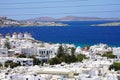 Picturesque view of Mykonos Island with whitewashed houses and windmills against blue Mediterranean sea, Greece Royalty Free Stock Photo