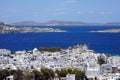 Picturesque view of Mykonos Island with whitewashed houses and windmills against blue Mediterranean sea, Greece Royalty Free Stock Photo