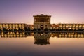 Picturesque view of Naqsh-e Jahan Square with a reflection on a purple sky background