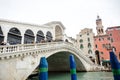 A picturesque view of the Rialto Bridge in the sunset, Grand Canal in Venice Italy