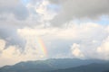 Picturesque view of sky with heavy rainy clouds and rainbow Royalty Free Stock Photo