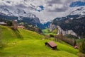 Picturesque view of sunlit meadow in Wengen Village and Lauterbrunnen valley, Bernese Oberland, Switzerland