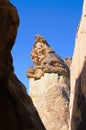 Picturesque view top of the famous Fairy Chimneys or Multihead stone mushrooms in Pasaba Valley near Goreme. Blue sky background. Royalty Free Stock Photo