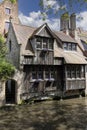 Picturesque view of water channels of the city near Beguinage Houses (Begijnhof), Bruges, Belgium Royalty Free Stock Photo