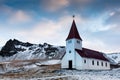 The Vik I Myrdal church at the top of the hill offering picturesque images of the atlantic ocean and the village of vik in