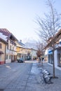 Picturesque village with a church in the country Austria in Europe during the winter Royalty Free Stock Photo