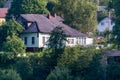 Yaroslavl region, Russia, July 4, 2023. A picturesque house on the river bank among the trees. Royalty Free Stock Photo