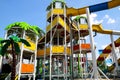 A picturesque water park with colorful multi-colored slides, rest in the resort in spring and summer, swimming and sports Royalty Free Stock Photo