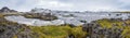 Picturesque waterfal Tungnaarfellsfoss, Iceland, panoramic autumn view Landmannalaugar mountains under snow cover in far