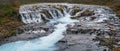 Picturesque waterfall Bruarfoss autumn view. Season changing in southern Highlands of Iceland Royalty Free Stock Photo