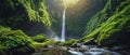 A Picturesque Waterfall Cascades Through Vibrant Rainforest, Framed By Majestic Green Mountains