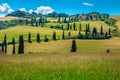 Picturesque winding rural road with cypresses in Tuscany, Italy, Europe Royalty Free Stock Photo