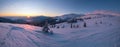 Picturesque winter alps sunrise. Highest ridge of the Ukrainian Carpathians is Chornohora with peaks of Hoverla and Petros