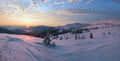 Picturesque winter alps sunrise. Highest ridge of the Ukrainian Carpathians is Chornohora with peaks of Hoverla and Petros