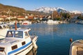 Picturesque winter landscape with small marina for fishing boats. Montenegro, Bay of Kotor. View of Marina Kalimanj in Tivat city Royalty Free Stock Photo