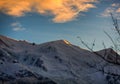 Picturesque Winter sunset in chamonix, view from the valley of chamonix.Haute Savoy, beautiful clouds over the peak of mon blanc Royalty Free Stock Photo