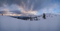 Picturesque winter windy and cloudy morning alps. Ukrainian Carpathians highest ridge Chornohora with peaks of Hoverla and Petros
