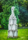 Pidhirtsi Castle. Sculpture on a background of green trees in the park Royalty Free Stock Photo