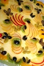 Pie decorated with many fruits