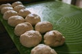 Pie dough balls on a rolling mat. Royalty Free Stock Photo